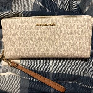Michael Kors Cream Monogram Zip Wristlet with Tan Strap